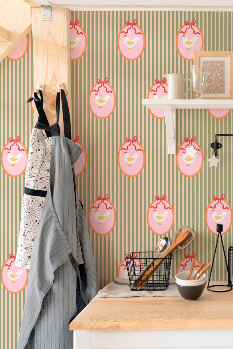 Self-adhesive wallpaper by Fancy Walls featuring cute green hens and soft stripes for relaxed country living spaces