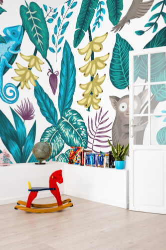 Fancy Walls Jungle Wildlife peel and stick PVC-free wall mural with tropical leaves, chameleon, butterflies, and jungle animals for nursery and kids room décor.