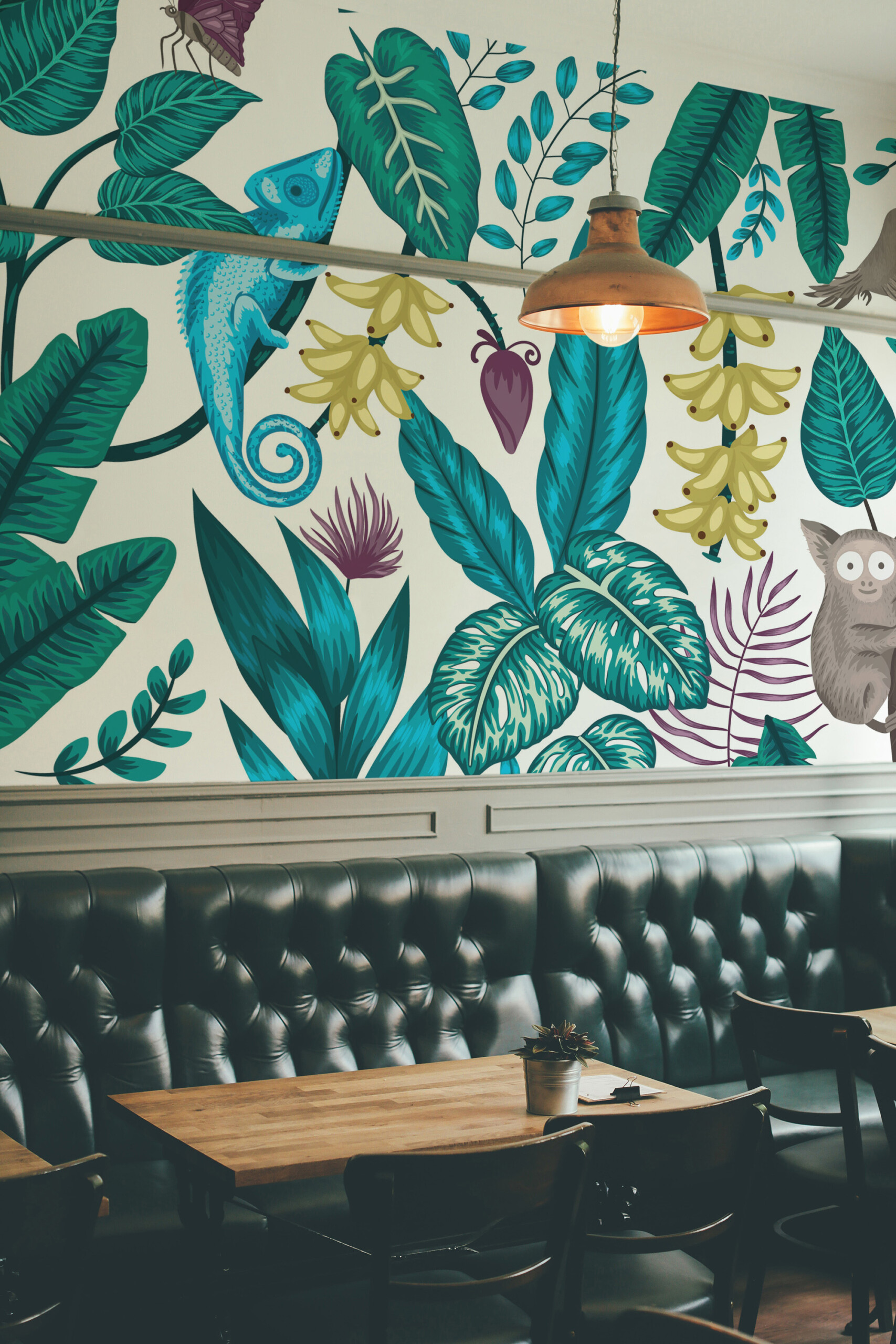 Fancy Walls Jungle Wildlife eco-friendly peel and stick wall mural with rainforest animals and lush botanical foliage for playful interiors.