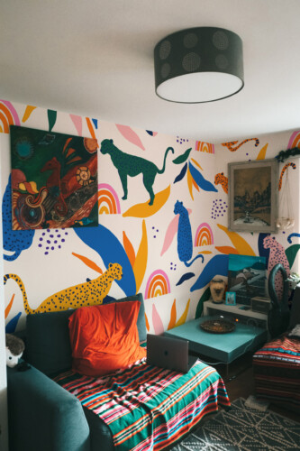 Fancy Walls traditional non-pasted eco-friendly wall mural featuring bold safari cats and rainbow accents for nurseries, playrooms, and creative décor.