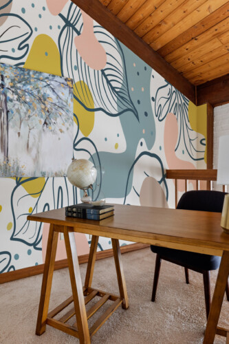 Fancy Walls Monstera Line Art Pop peel and stick PVC-free wall mural with abstract monstera leaf outlines and modern color shapes for contemporary interiors.