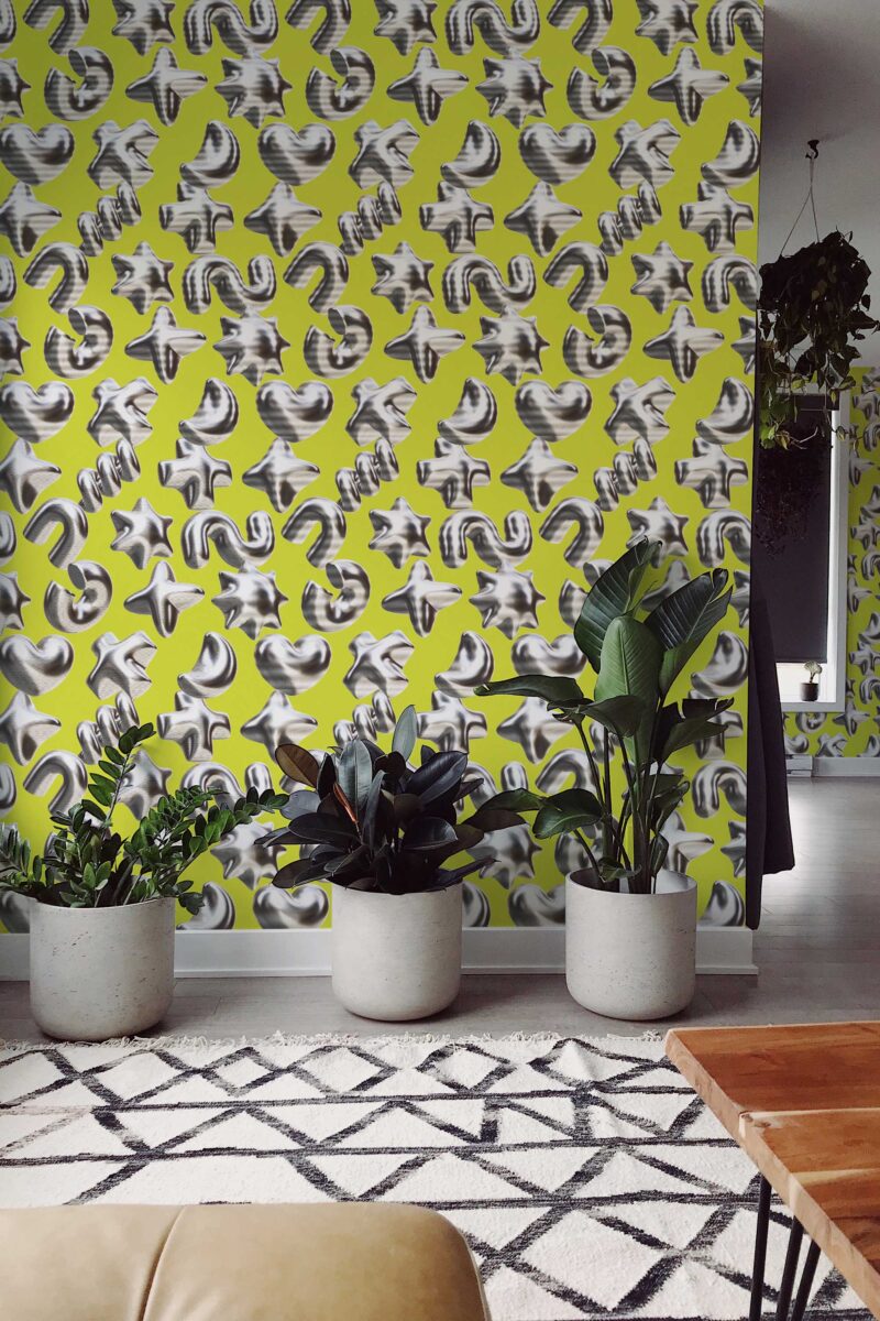 Room featuring chartreuse and silver element wallpaper print.