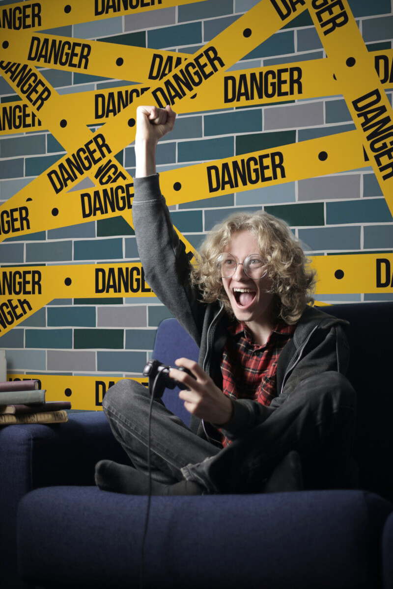 Urban Danger Zone traditional non-pasted wall mural featuring warning tape graffiti style, adding bold urban look to teen boys room