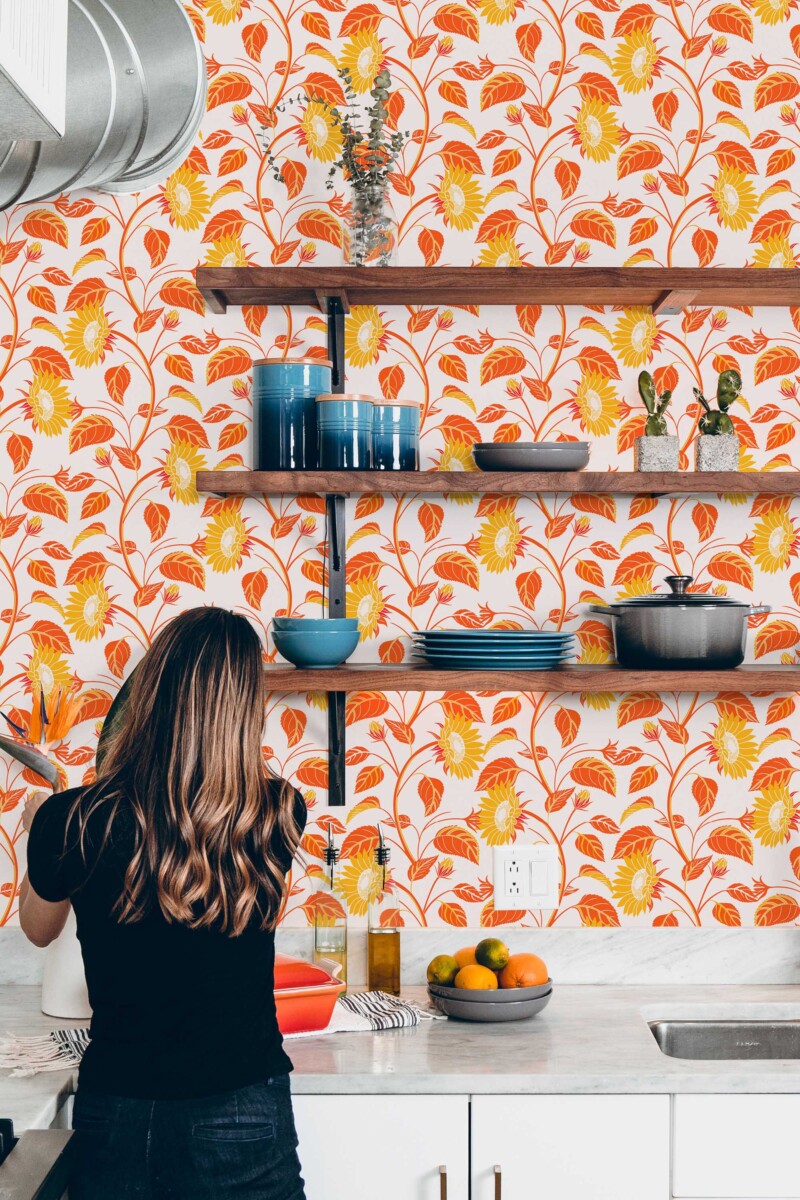 Fancy Walls wallpaper for walls in retro red sunflower pattern with warm orange blooms for vibrant kitchens