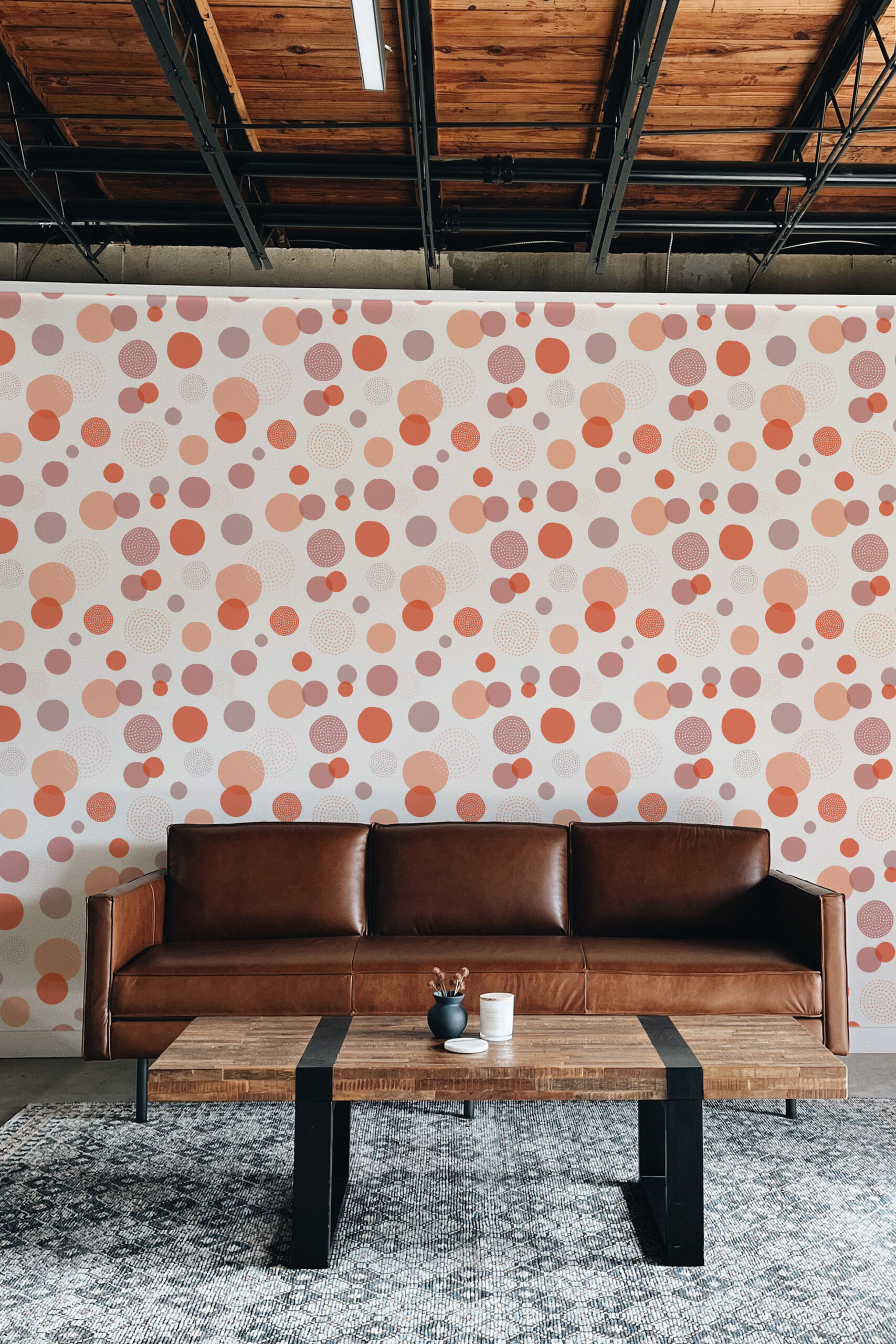 Bold Orange Polka Dot self-adhesive wallpaper with scattered orange, blush, and mauve circles on a light background.