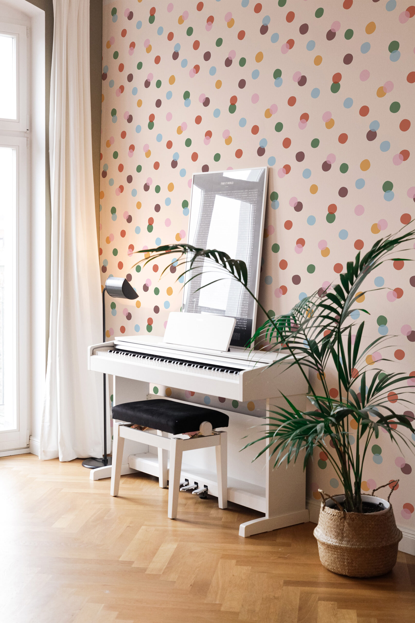 Vintage Colorful Polka Dot self-adhesive wallpaper covering an accent wall behind a white piano, with scattered multicolor dots on beige.