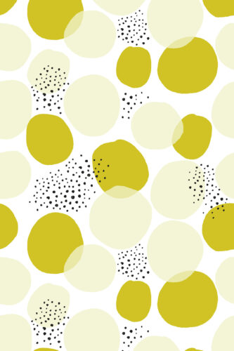 Bold Chartreuse Polka Dot removable wallpaper with oversized chartreuse and pale cream dots and scattered black speckles.