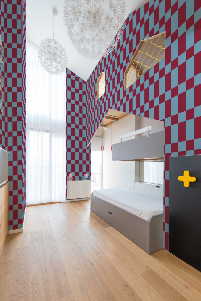 Trending Teen Geometric by Fancy Walls peel and stick wallpaper in burgundy and blue checkerboard for bold teen bedrooms