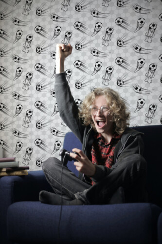 Dynamic Soccer peel and stick wallpaper with footballs in motion over hexagon background, perfect for game room décor