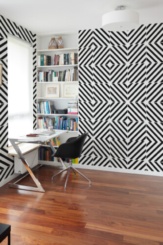 Hypnotic 3D Tiles peel and stick wall mural with black and white geometric lines creating optical illusion effect for office décor