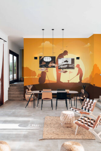 Sunset Family Golf wallpaper mural spanning a dining room wall with golfer silhouettes against an orange sunset sky.