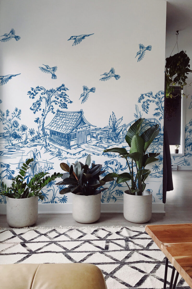 Blue Pagoda Garden wallpaper mural shows a blue line-drawn pagoda, garden trees, and birds across a full wall mural.