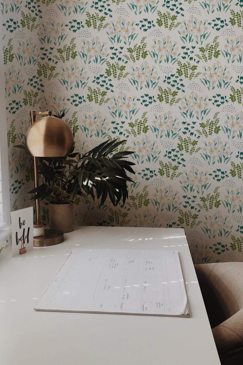 A floral wallpaper design next to a desk