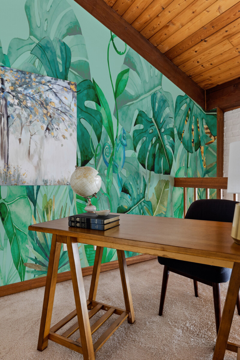 Tropical Green Oasis removable wall mural with monstera leaves and jungle plants, creating lush tropical living room atmosphere
