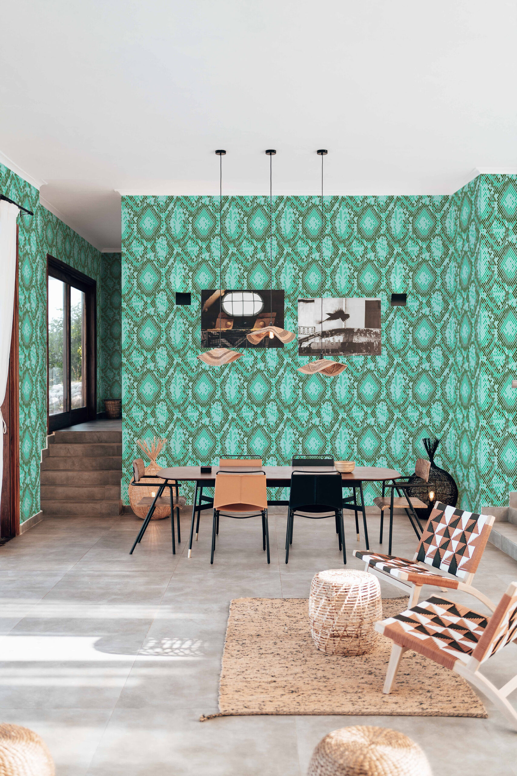 Dense Teal Snakeskin Look non-pasted wallpaper covering the dining room walls with a repeating snakeskin-inspired pattern.