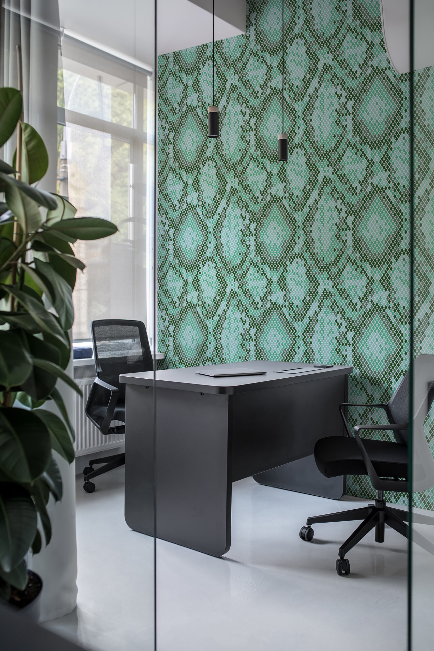 Dense Teal Snakeskin Look pre-pasted wallpaper with a teal scaled pattern covering an office accent wall.