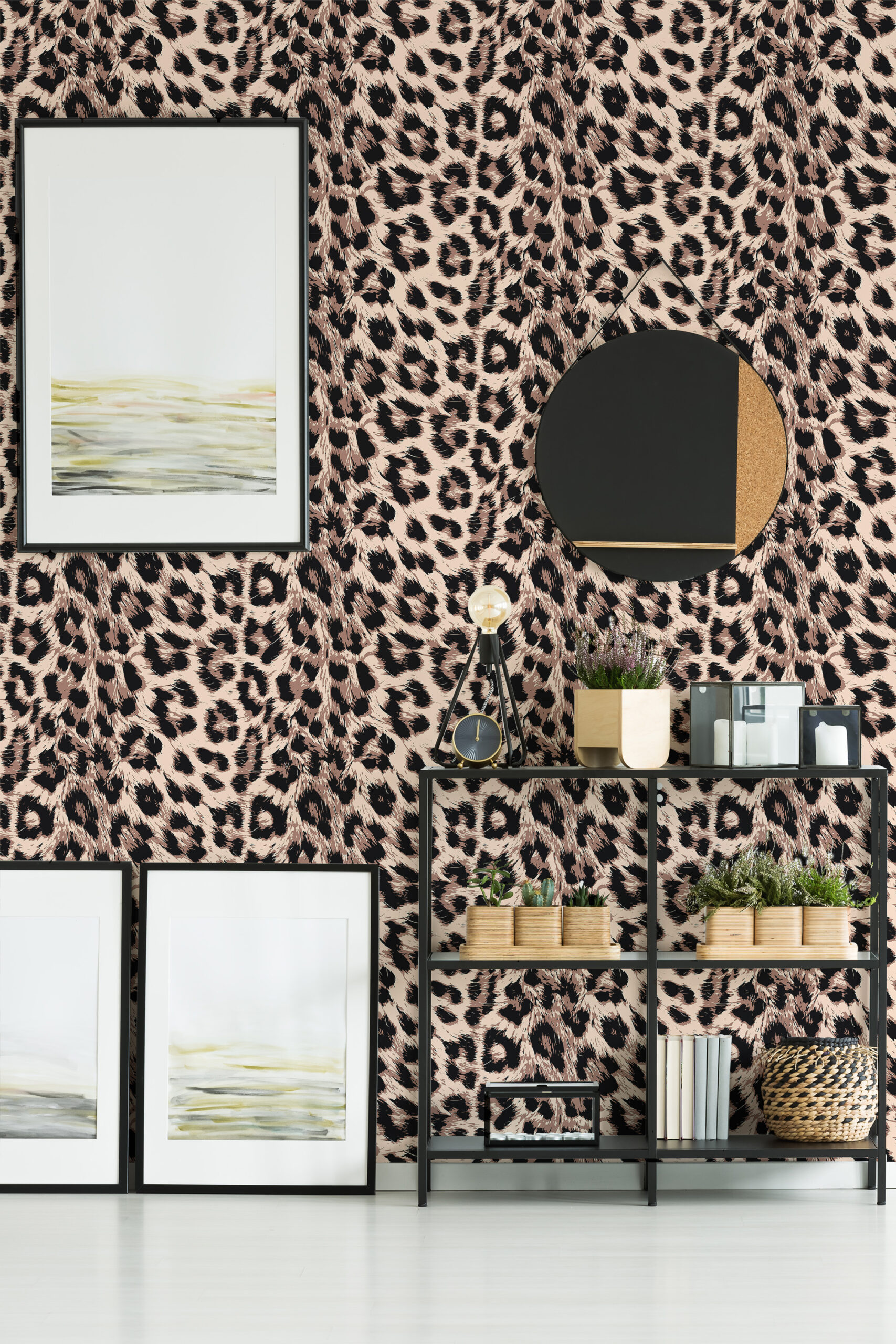Bold Leopard Print Imitation pre-pasted wallpaper with black and blush leopard spots covering the full wall behind framed art and shelves.