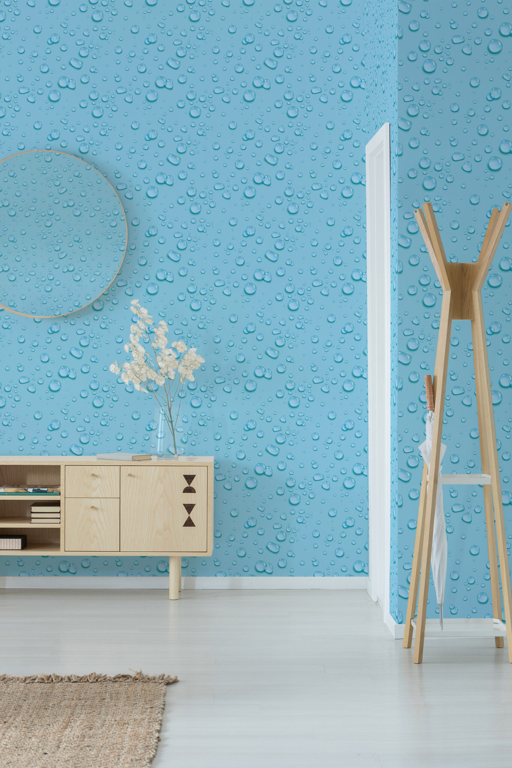 Dense Turquoise Raindrops self-adhesive wallpaper with glossy water droplet pattern covering an accent wall in a modern room.
