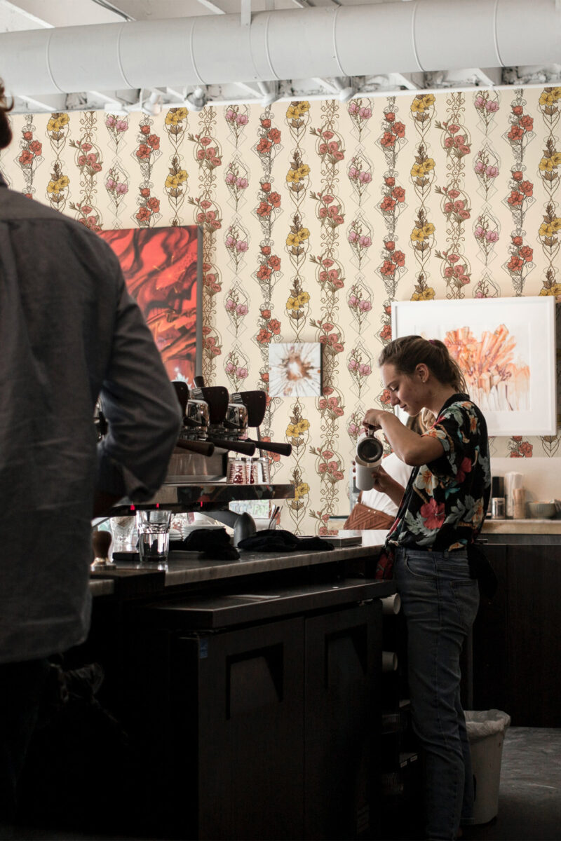 Floral Symphony peel and stick wallpaper with vertical floral stripes in red, pink, and gold on a cream background.
