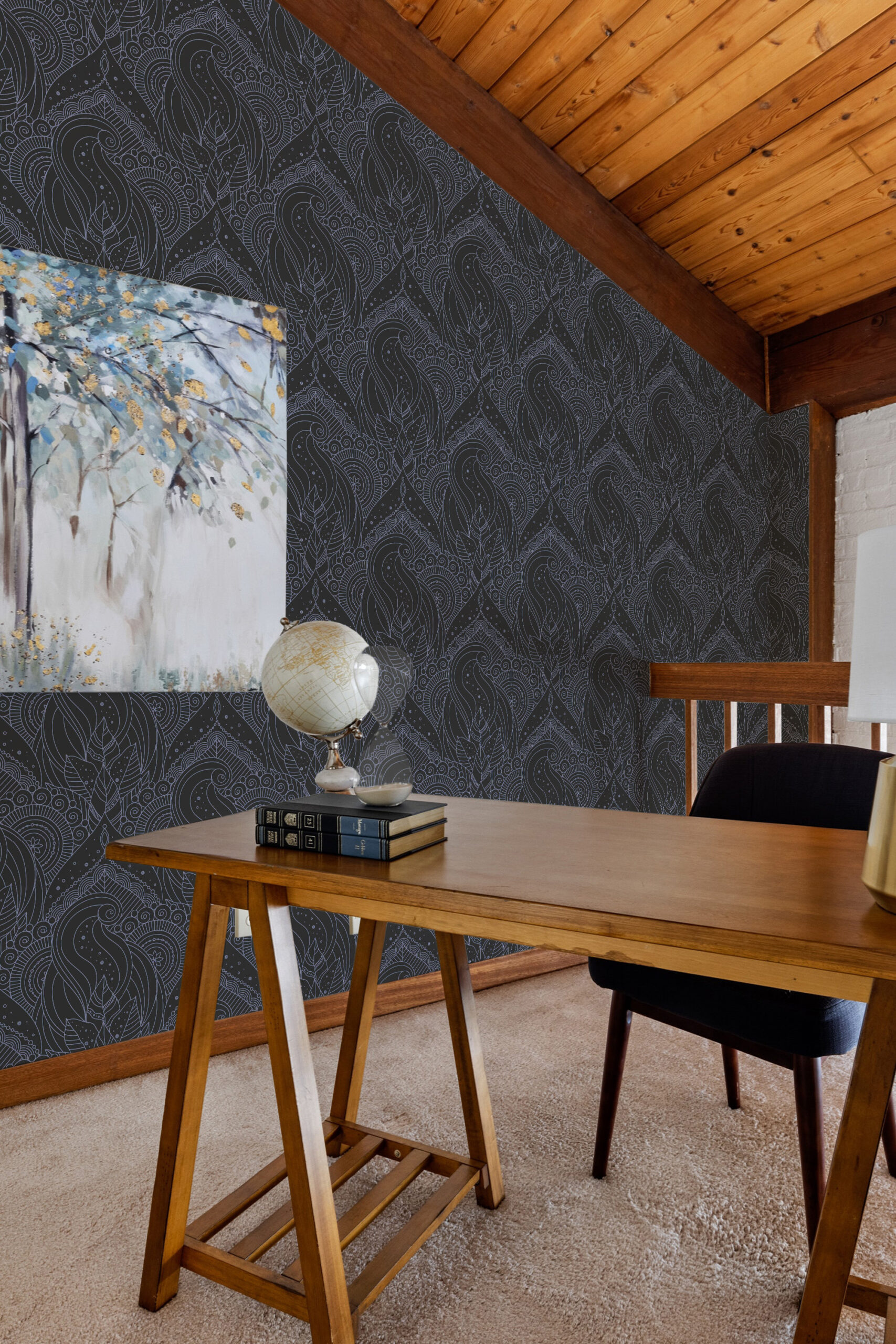 Astral Botanical Elegance non-pasted wallpaper with pale leaf outlines and swirling details covering an accent wall behind a desk.