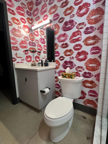 Red and pink kiss peel and stick wallpaper installed in bathroom - review picture submitted by Jurgis