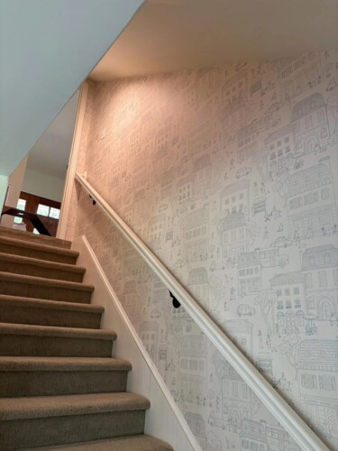 Small Town Charm Wallpaper peel and stick wallpaper installed in hallway - review picture submitted by Jurgis