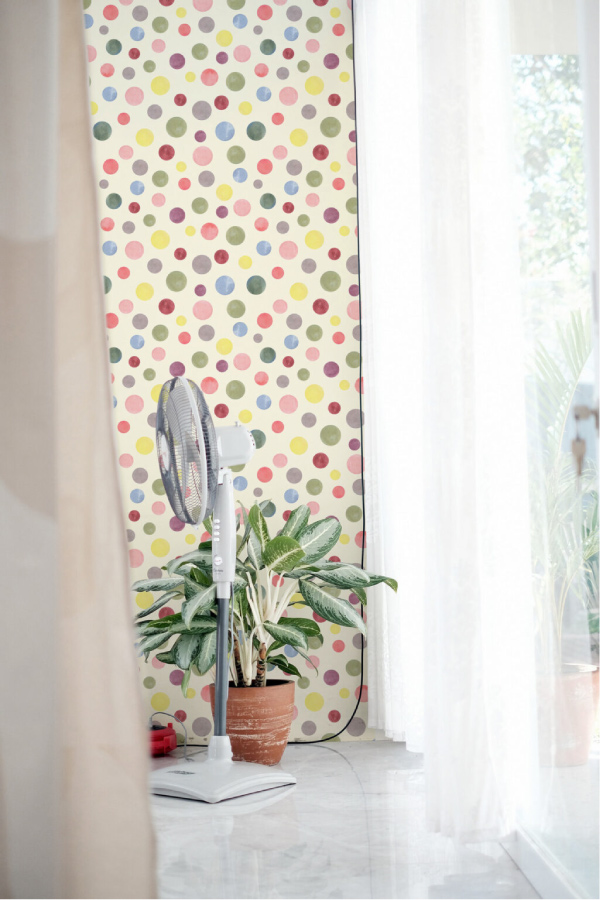 Colorful polka dot wallpaper in bedroom 