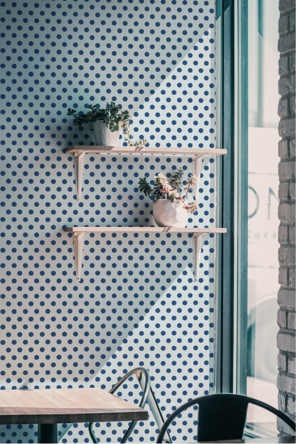 Blue polka dot wallpaper in cafe 
