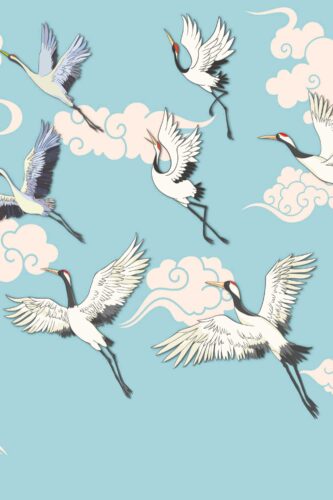 Flying Cranes Chinoiserie Blue shows a repeating removable wallpaper mural of white cranes and stylized clouds on a pale blue sky.