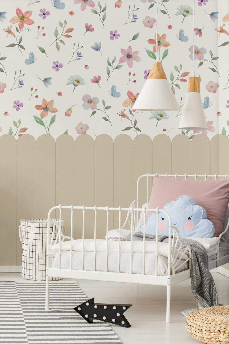 Whimsical Floral Border floral scatter removable wall mural with a tan scalloped border above a child’s white metal bed.