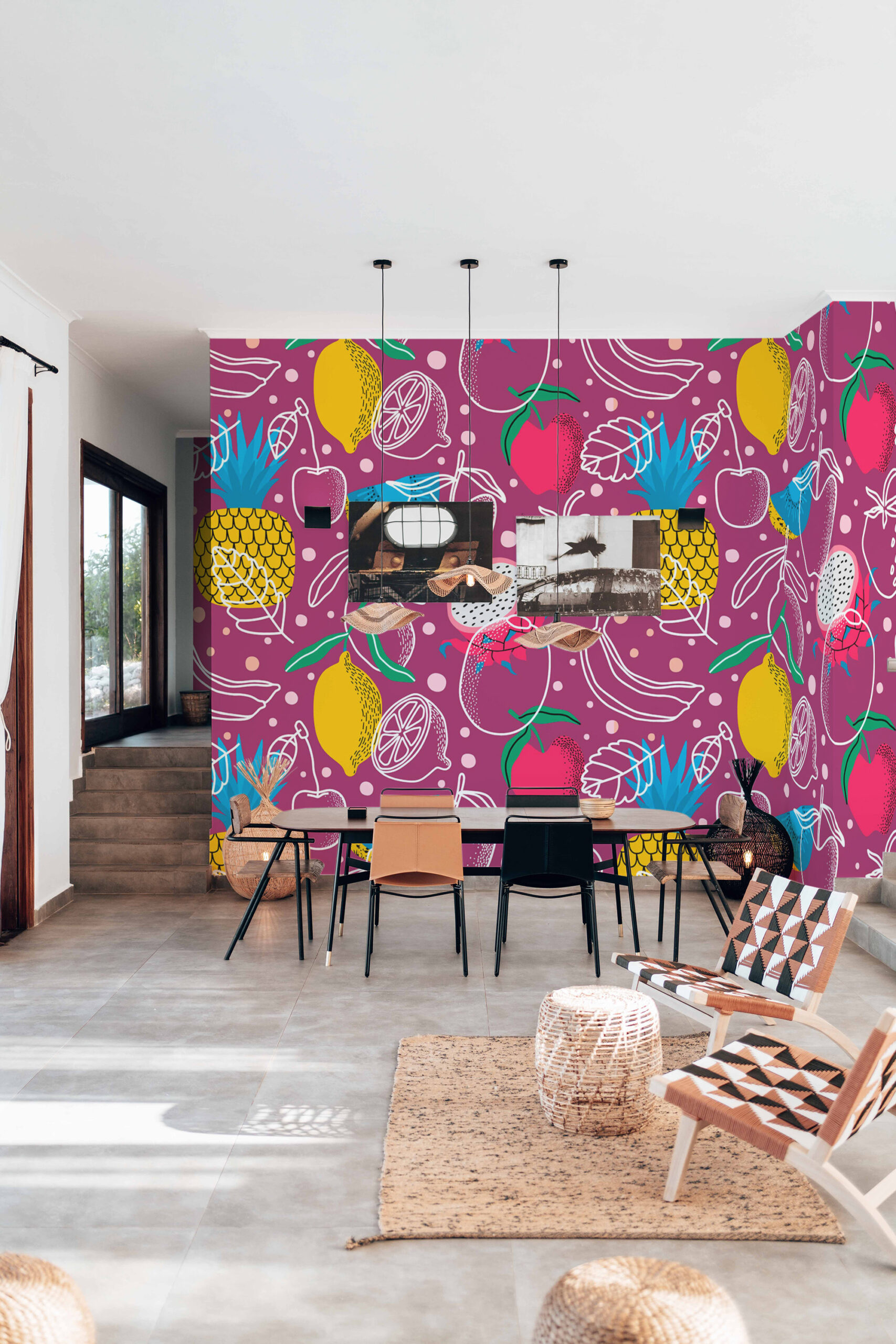 Tropical Fruit Doodles mural wallpaper covering a dining room wall with bold fruit line art on a magenta background.