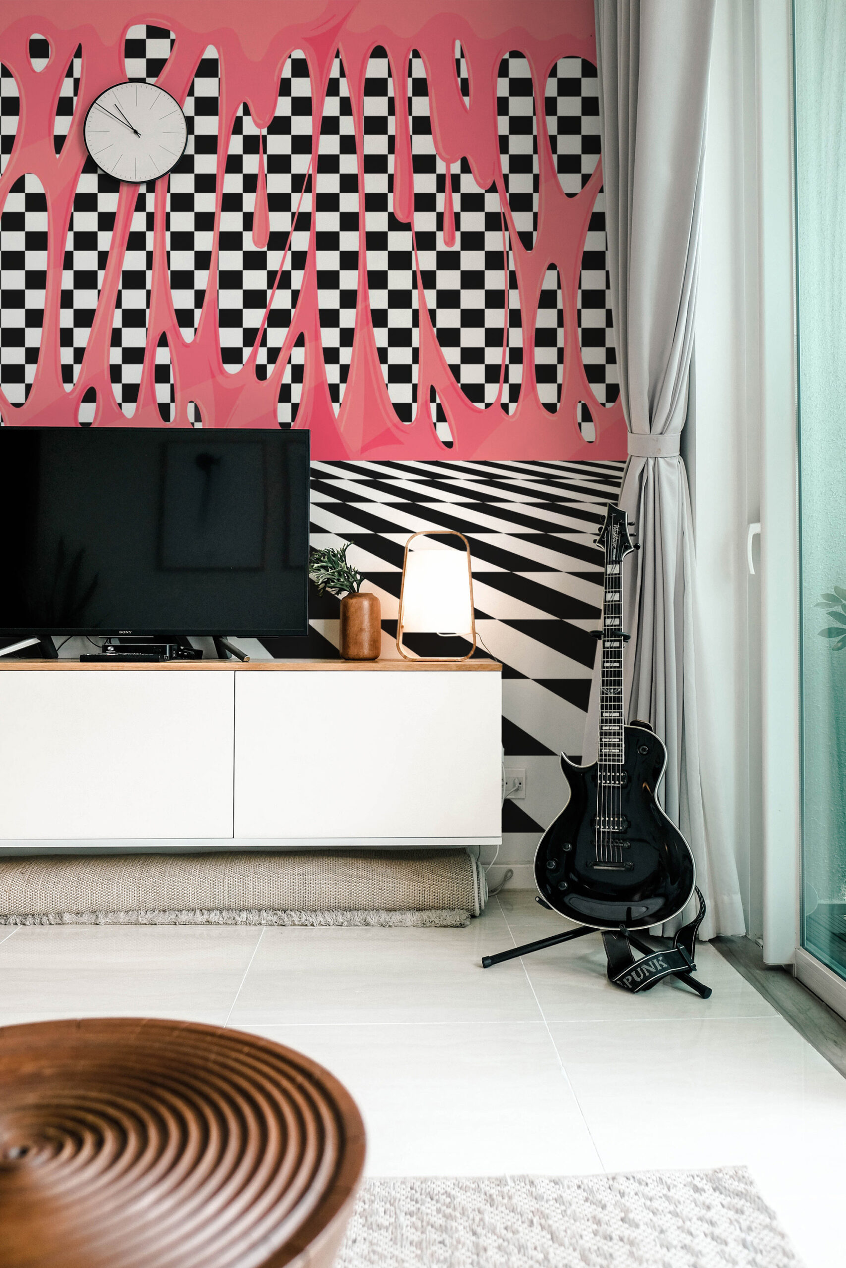 Bubblegum Drip Checkerboard wall mural covering a full feature wall with pink drips over a black-and-white checkerboard.