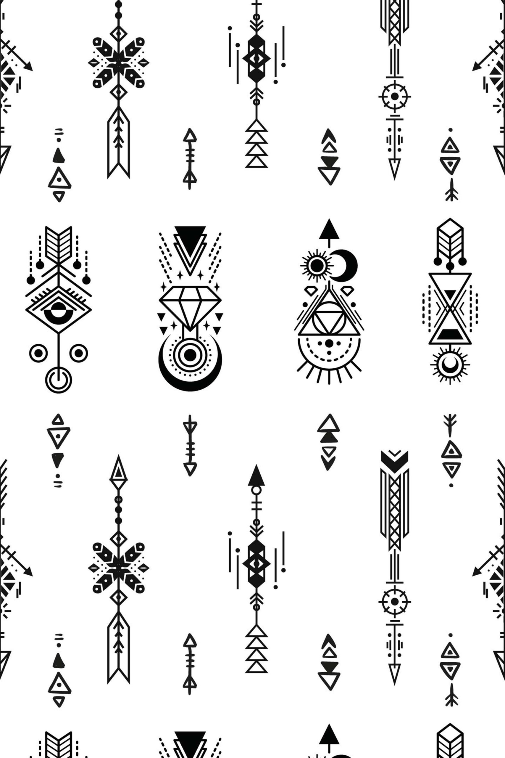 Sacred Tattoo Sigils removable wallpaper with black geometric arrows, diamonds, and celestial symbols on a white background.