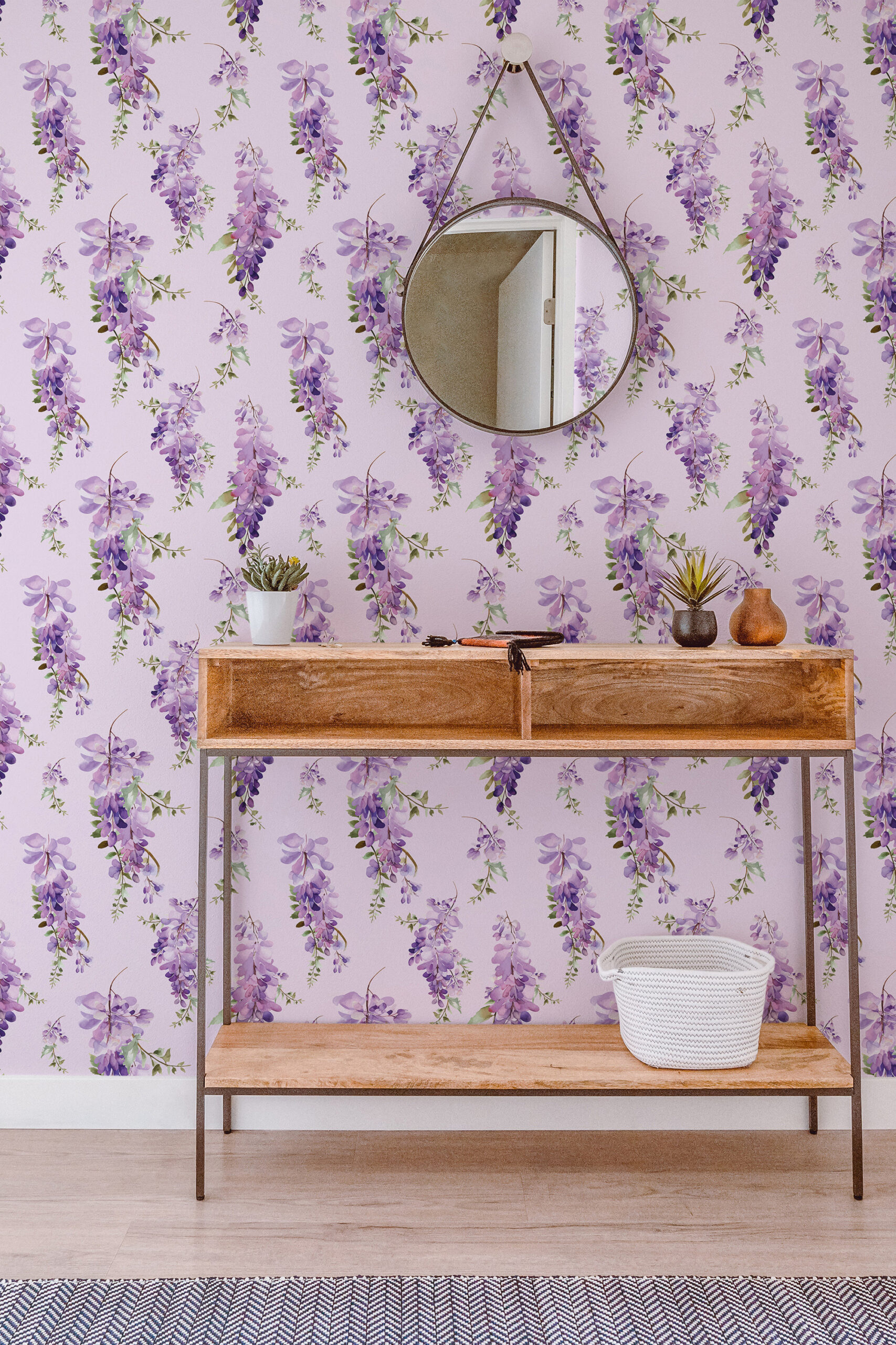 Delicate Purple Wisteria self-adhesive wallpaper with trailing lavender wisteria blossoms on a soft lilac background.