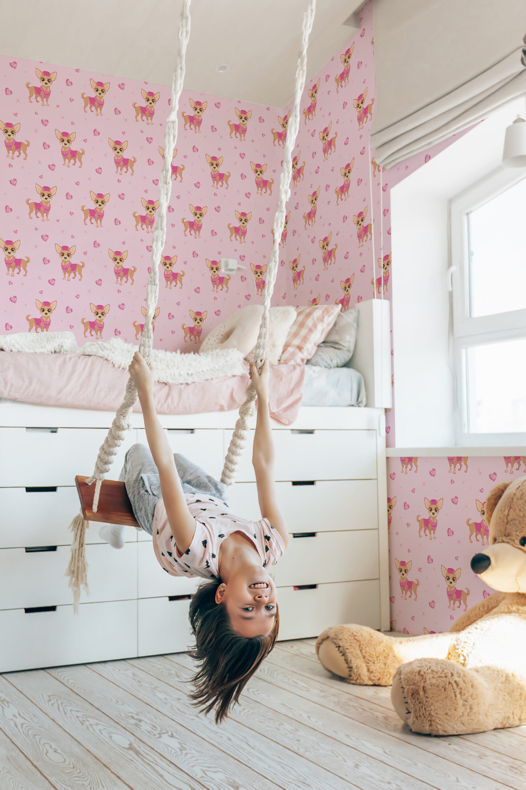 Cute Chihuahua pre-pasted wallpaper with cute chihuahuas and hearts covering the walls of a bright kids bedroom.