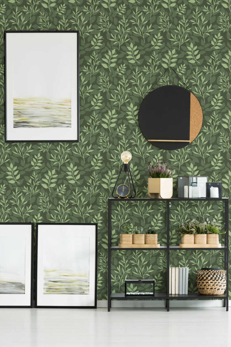 Dense Green Leaf peel and stick wallpaper with layered light-green leafy vines on a deep green background.