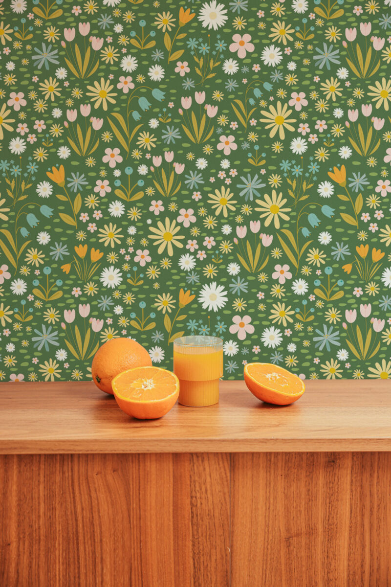 Playful Floral peel and stick wallpaper with scattered daisies, tulips, and small blooms on an olive green background.