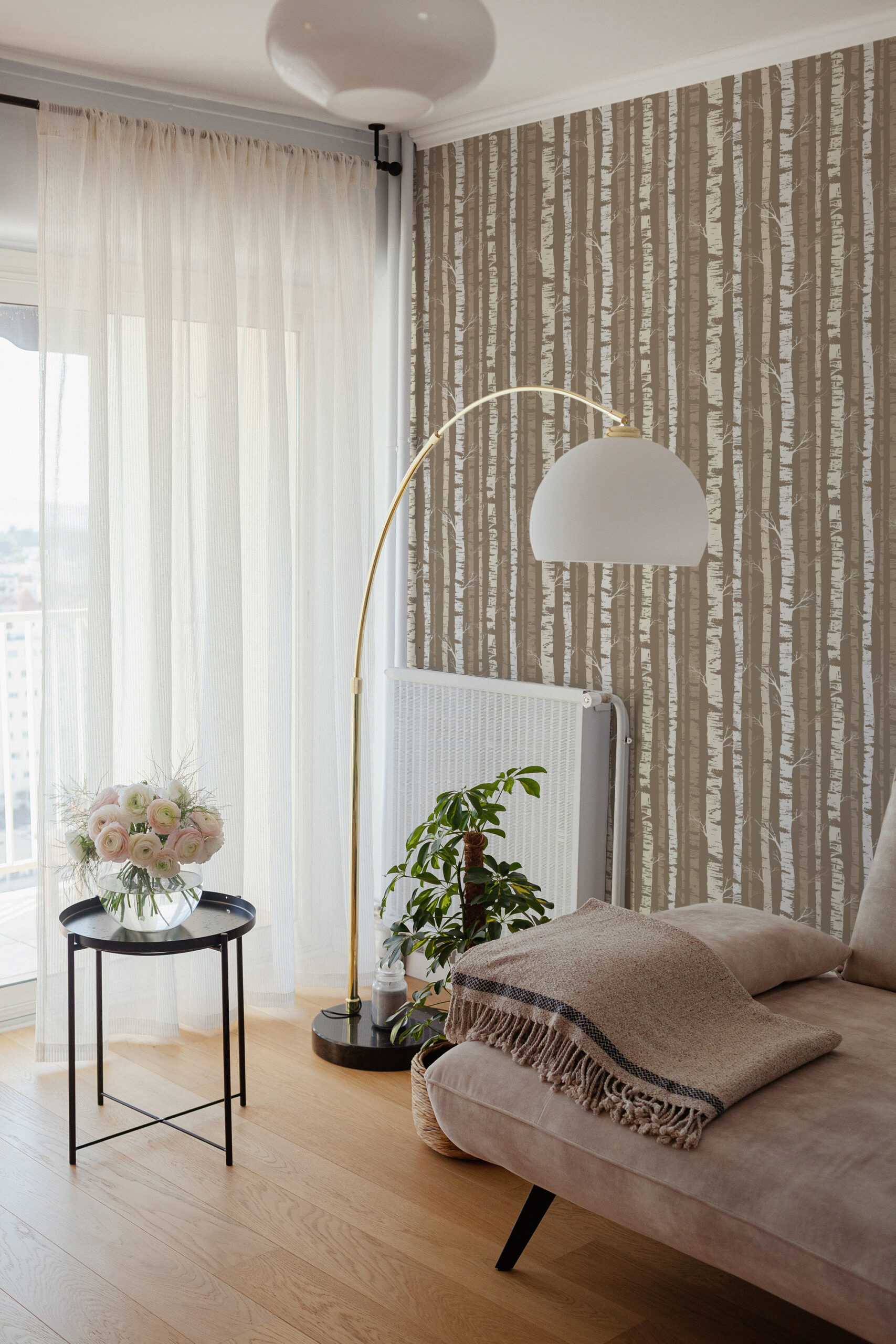 Dense Beige Birch Tree non-pasted wallpaper with vertical birch trunks on an accent wall behind a floor lamp.