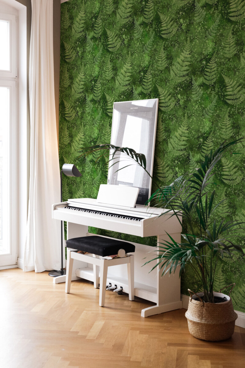 White piano against green fern wallpaper in a bright living room