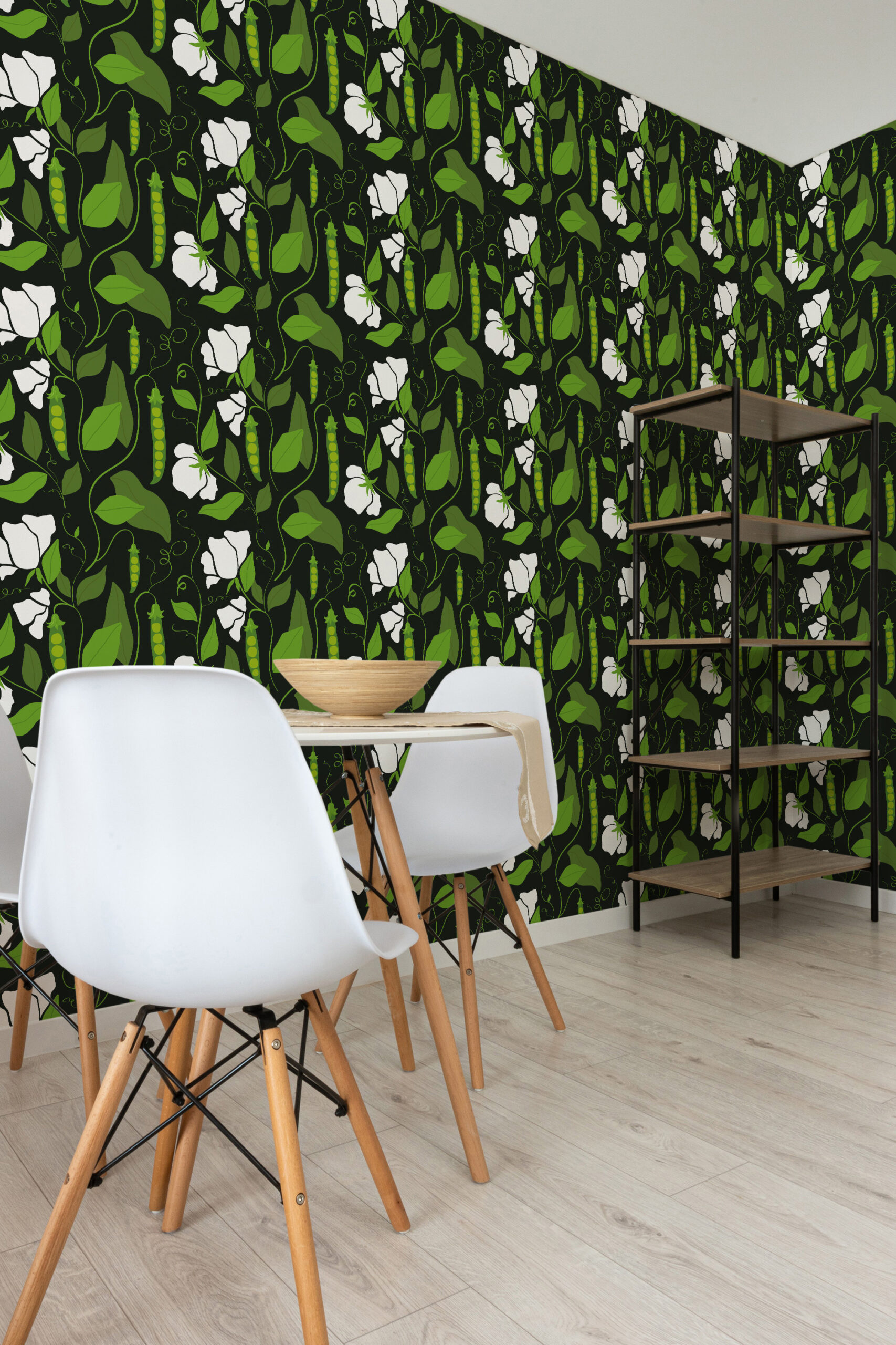 Bold Pea Pod self-adhesive wallpaper with green vines, pea pods, and white blossoms on a black wall.