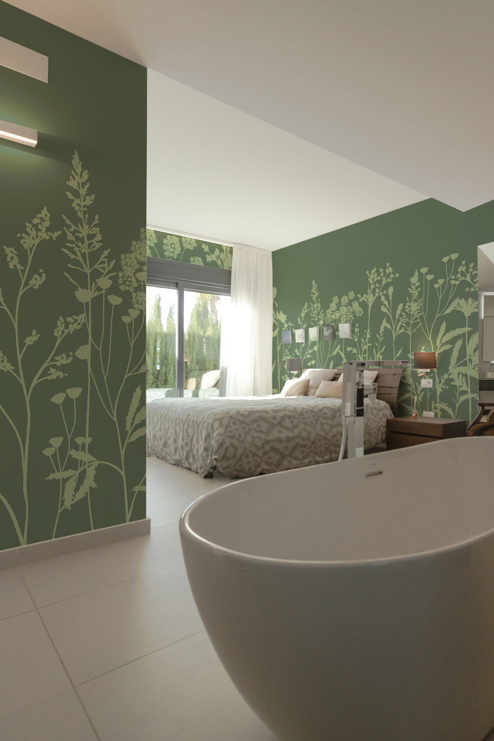 Green Meadow Wildflowers pre-pasted wall mural wraps the bedroom walls in olive green with pale wildflower silhouettes behind the bed.