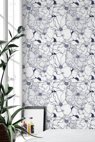 Bold Navy Flower peel and stick wallpaper with navy line-drawn blooms covering a full wall beside a bright window.