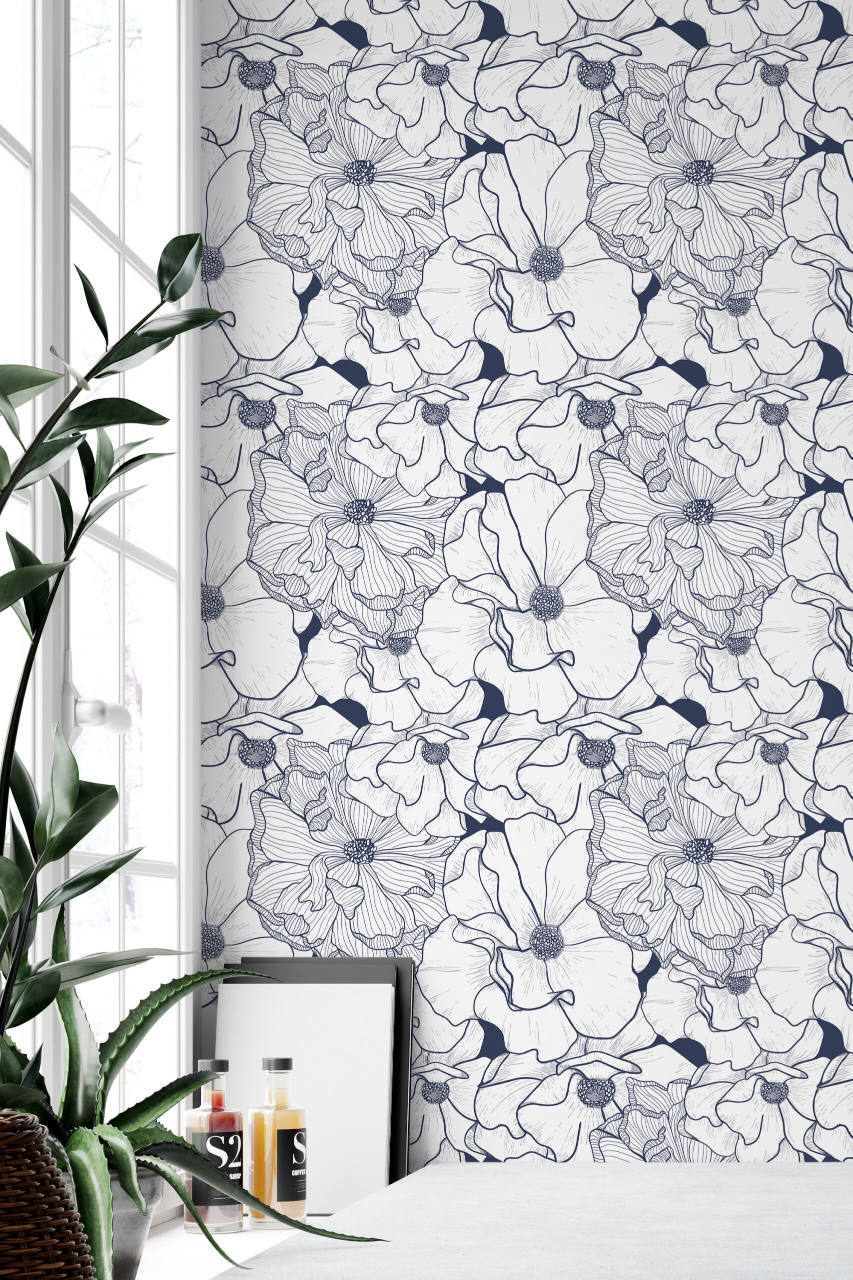 Bold Navy Flower peel and stick wallpaper with navy line-drawn blooms covering a full wall beside a bright window.