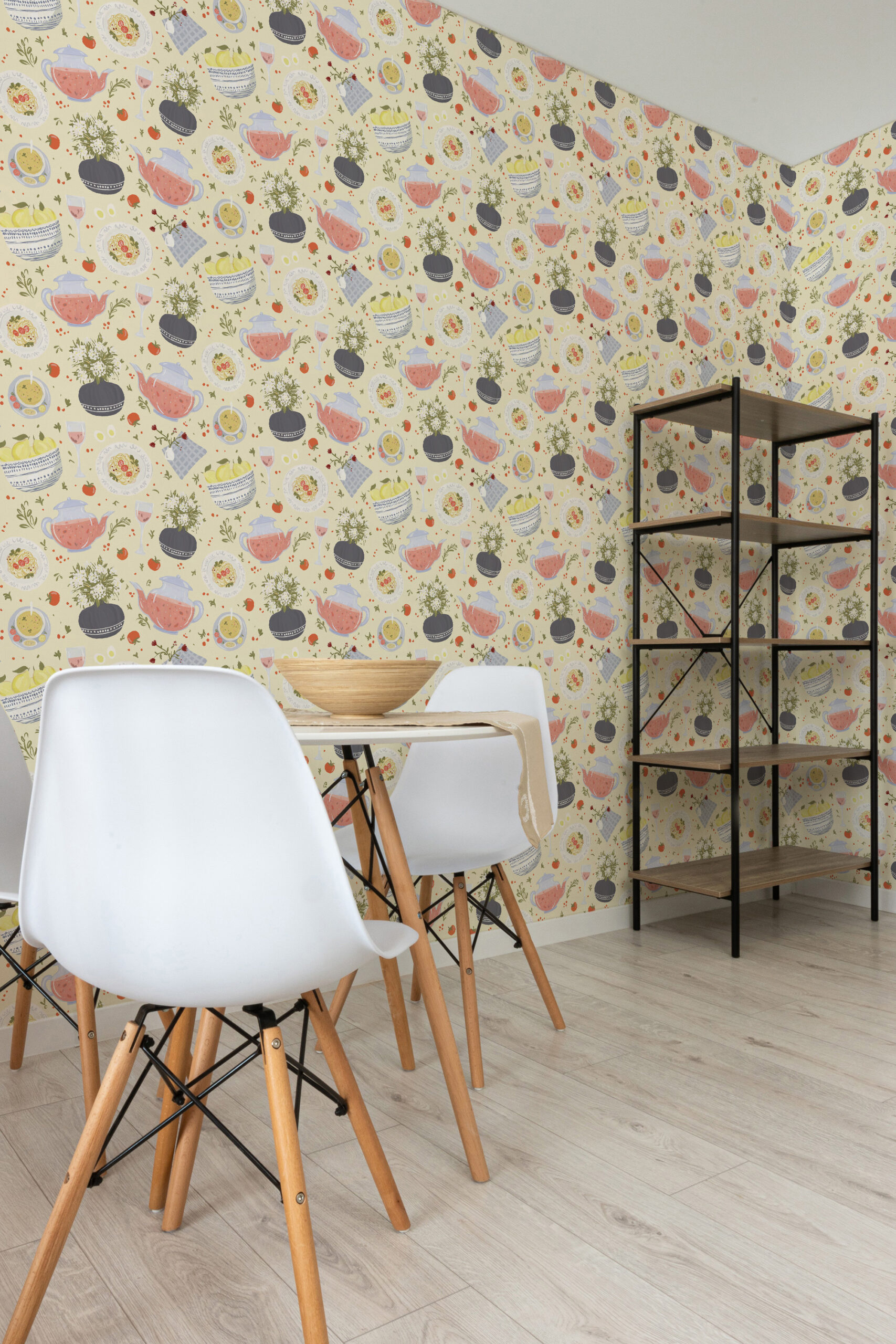 Whimsical Cream Dinnerware self-adhesive wallpaper with teapots, plates, and fruit illustrations across a dining nook wall.