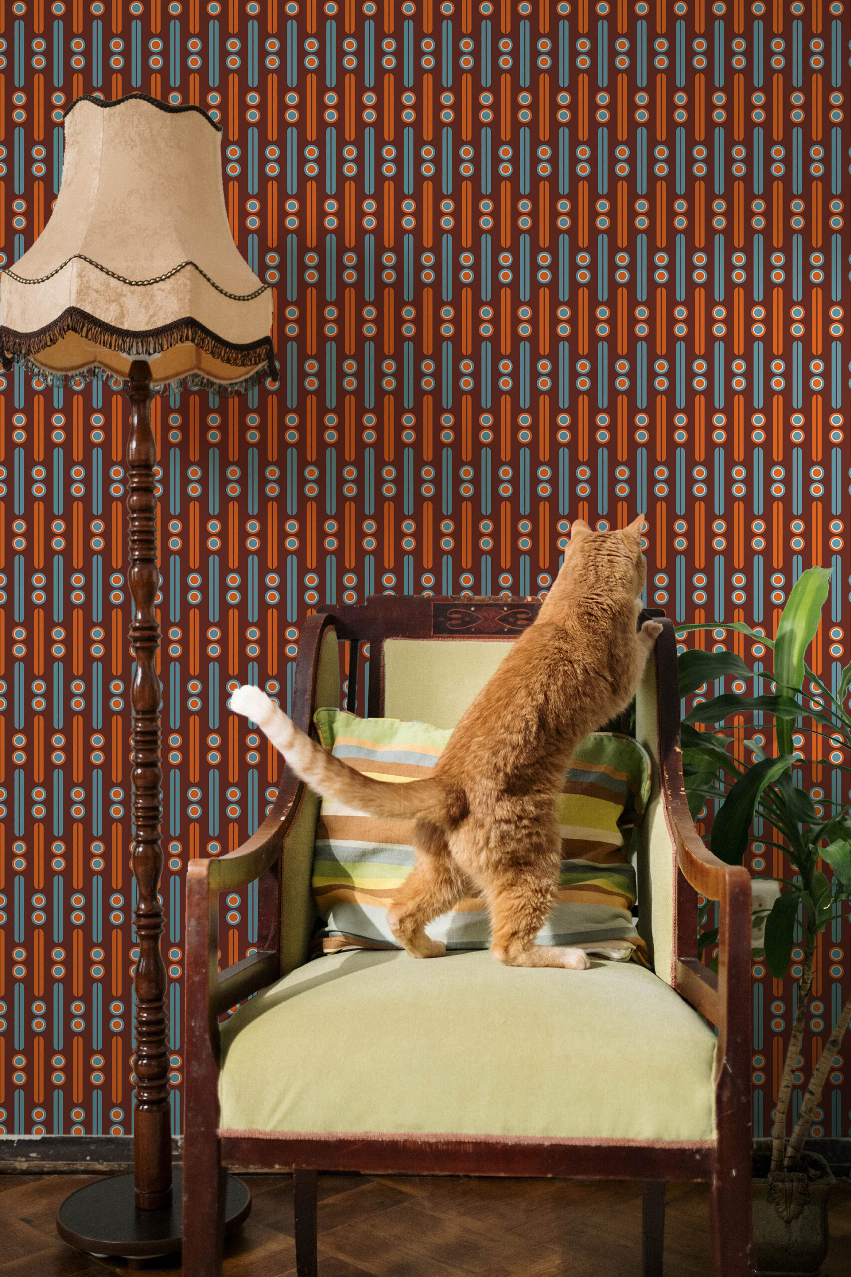 Retro Burgundy Geometric pre-pasted wallpaper with vertical bars and dot rows, shown behind a vintage armchair and floor lamp.