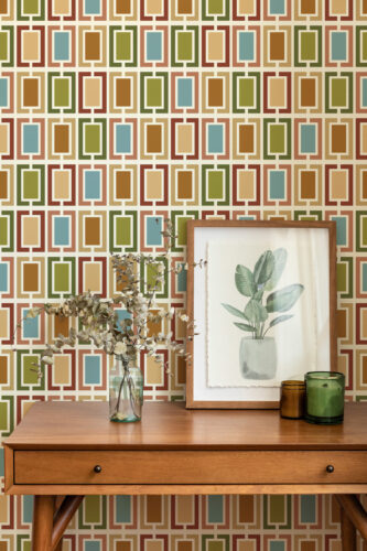 Retro White Geometric Frames peel and stick wallpaper with repeating multicolor rectangular frames shown above a wooden console.
