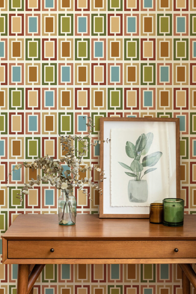 Retro White Geometric Frames peel and stick wallpaper with repeating multicolor rectangular frames shown above a wooden console.