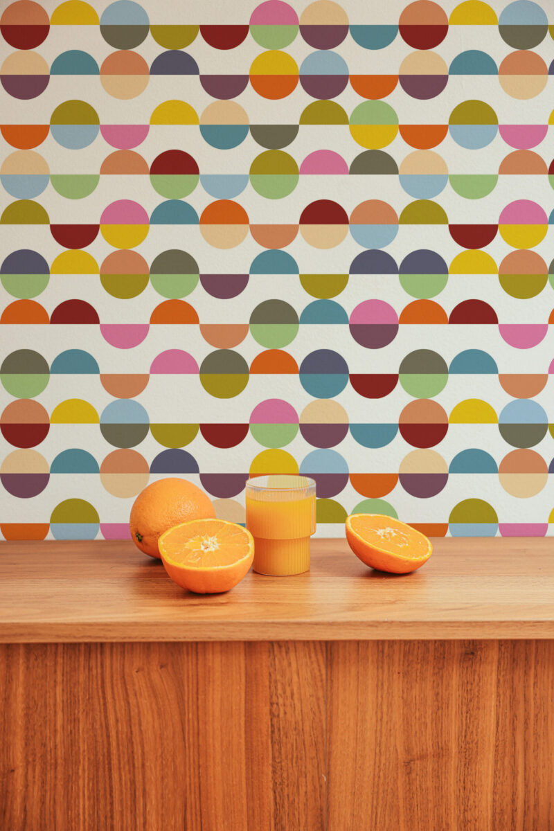 Colorful Retro Half-Circle peel and stick wallpaper with rows of colorful half circles above a wooden counter.