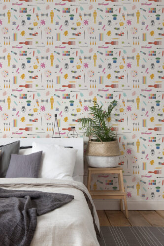 Fun Cream Art Supplies peel and stick wallpaper with scattered paint tubes, brushes, palettes, and pencils on a light background.