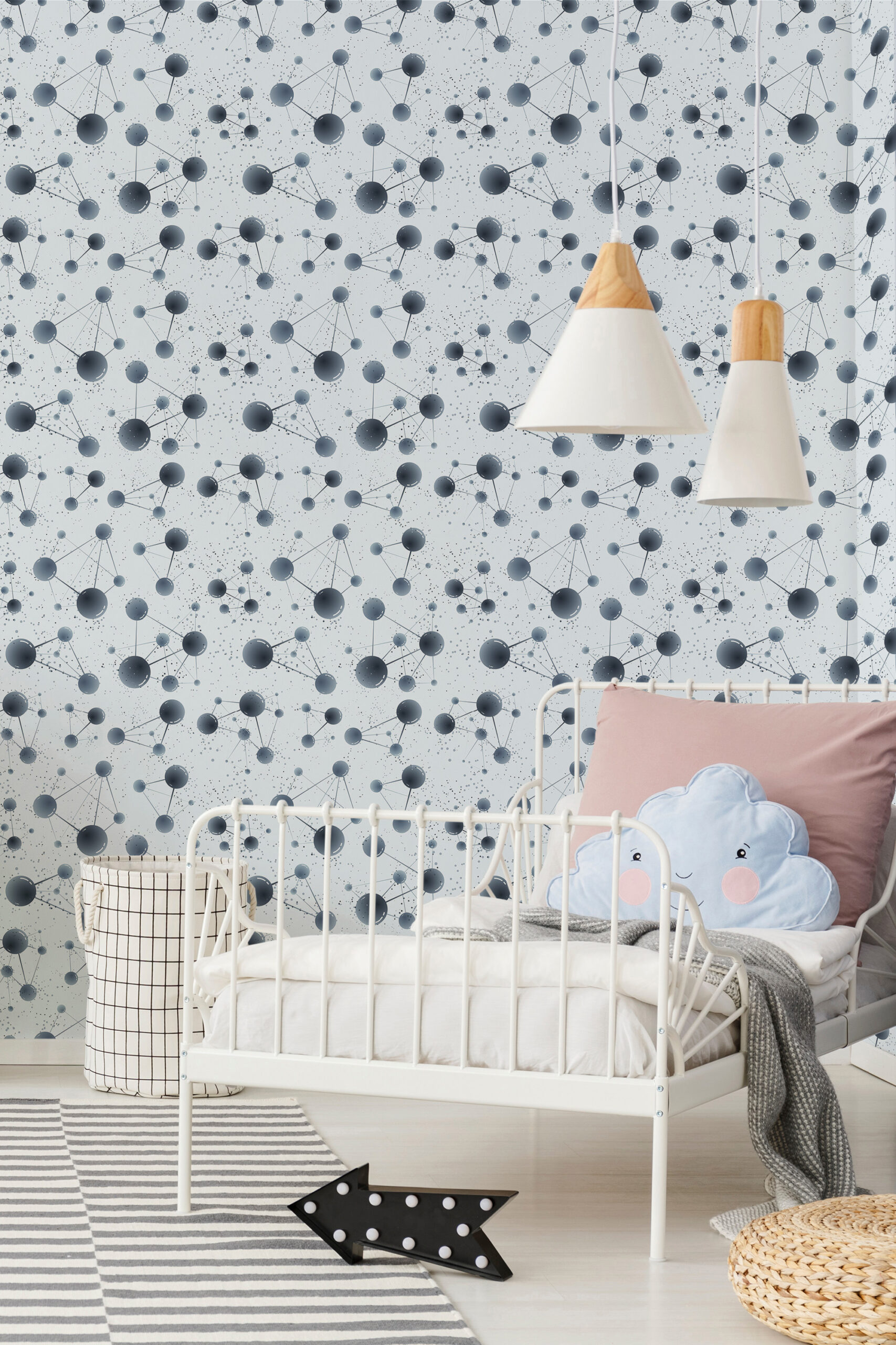Fine Blue Network Orbs peel and stick wallpaper with connected blue-gray circles behind a child’s bed on an accent wall.